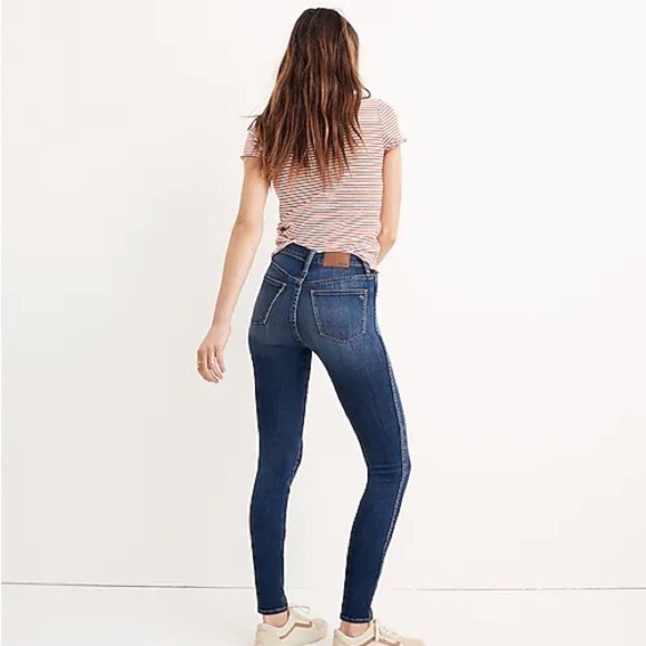 Madewell dark wash with holes high riser skinny jeans